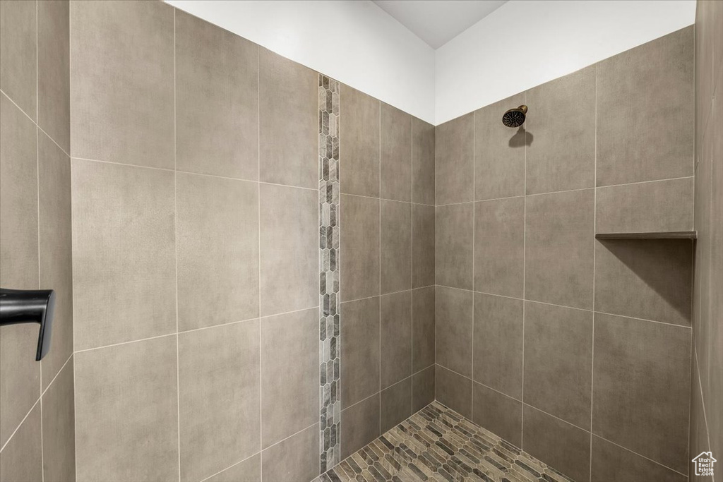 Bathroom with tiled shower