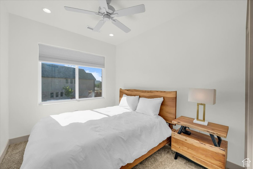 Bedroom featuring recessed lighting, a ceiling fan, carpet, and baseboards