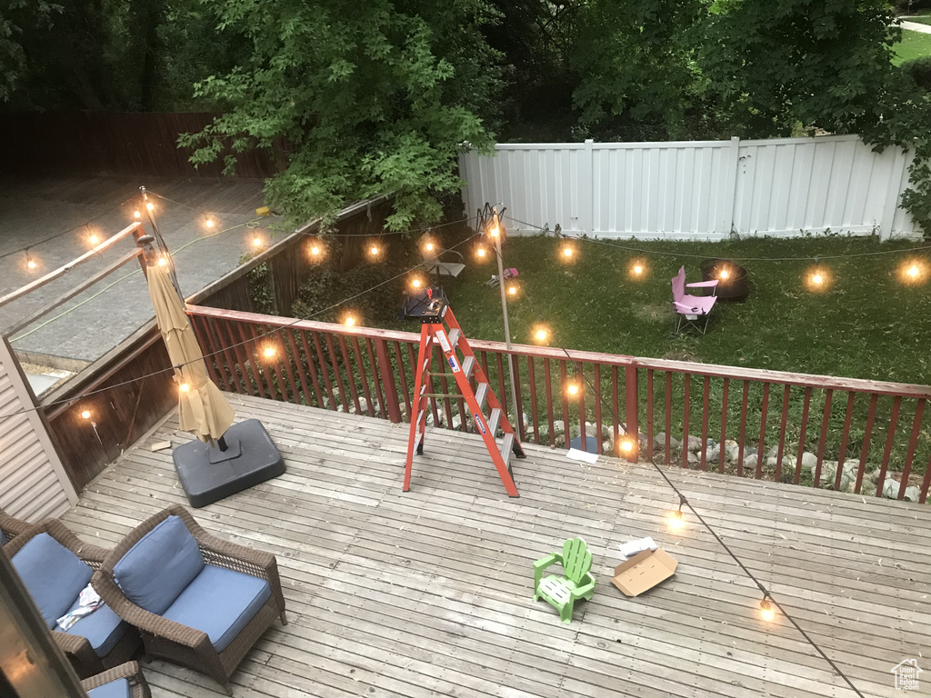Deck at twilight with fence