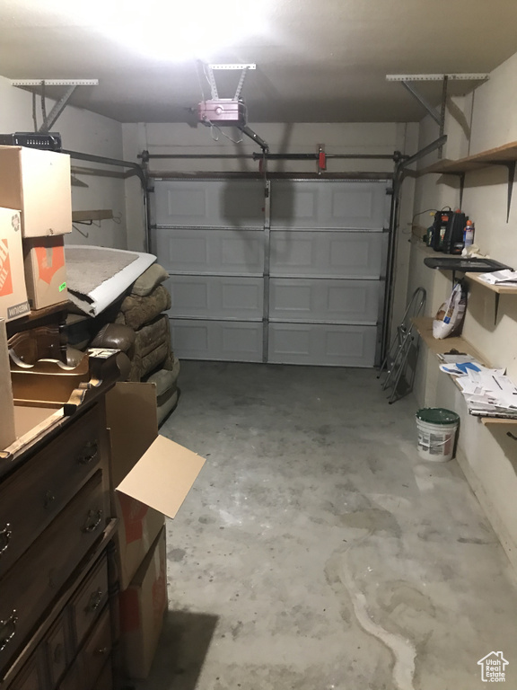 Garage featuring a garage door opener