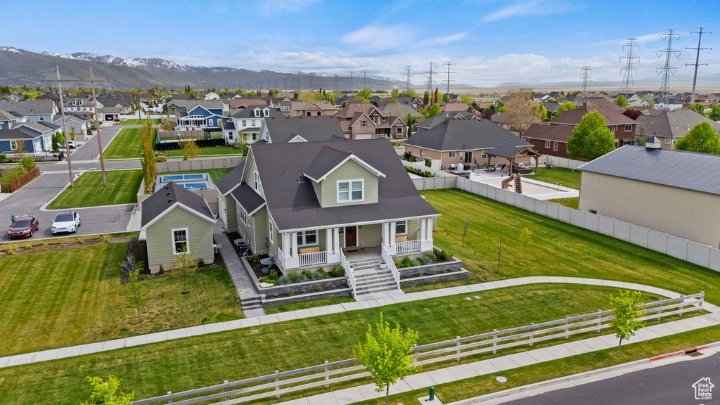 Birds eye view of property featuring a mountain view and a residential view