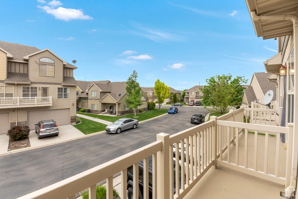 Balcony featuring a residential view