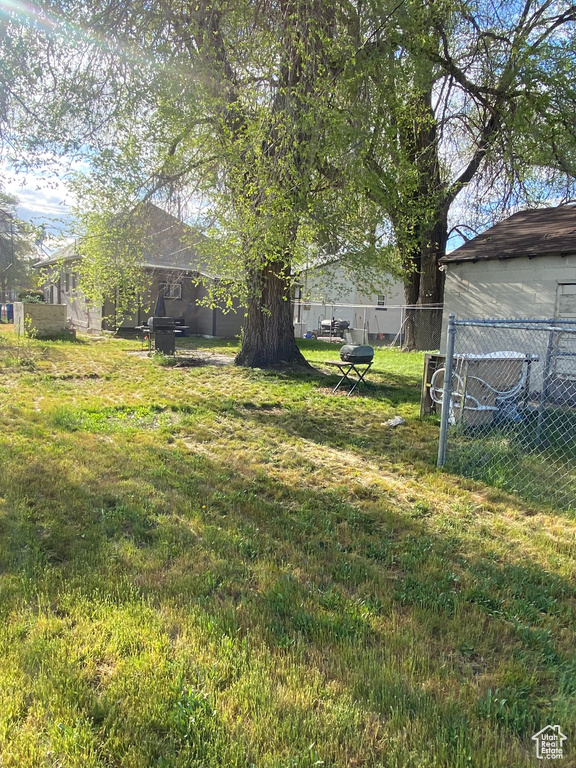 View of yard with fence
