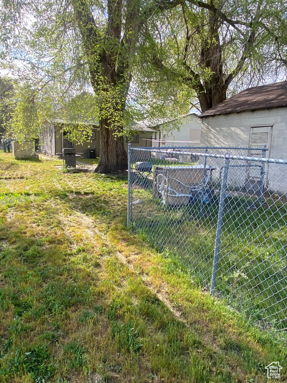 View of yard with fence