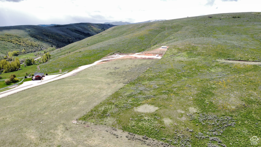 Aerial overview of property\'s location featuring mountains and rural landscape