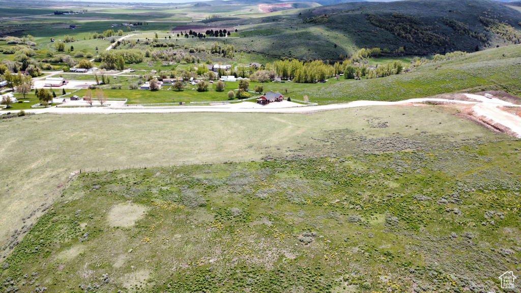 Overview of rural landscape with a mountainous background