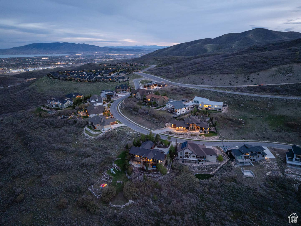 Birds eye view of property with a mountain view