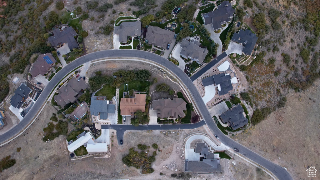 Birds eye view of property with a residential view