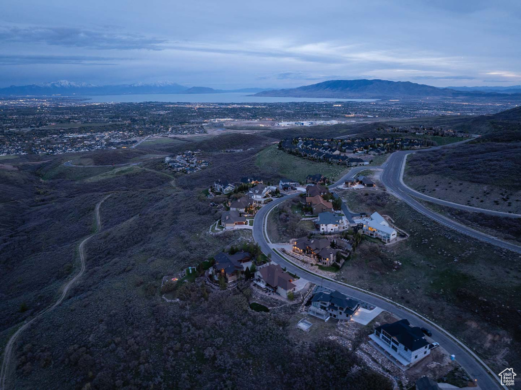 Birds eye view of property with a mountain view