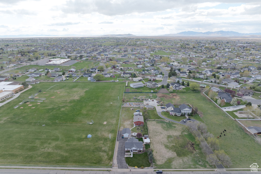 Drone / aerial view featuring a residential view and a mountain view