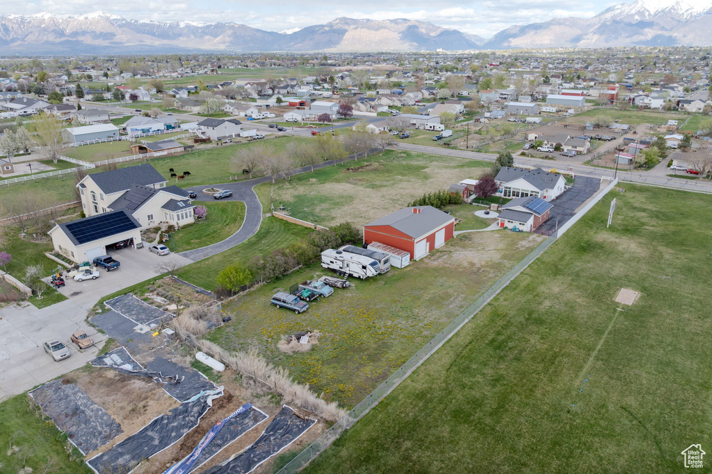Birds eye view of property featuring a residential view and a mountain view