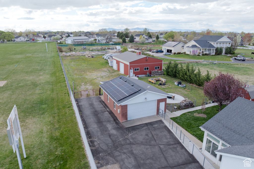 Drone / aerial view with a mountain view and a residential view