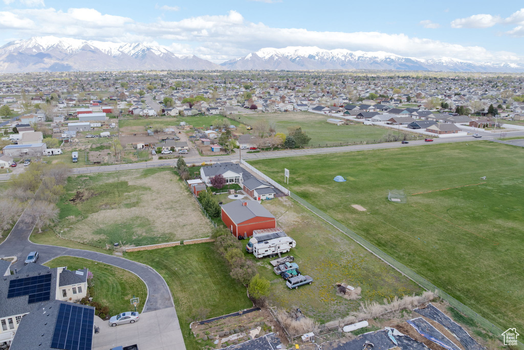 Drone / aerial view featuring a residential view and a mountain view