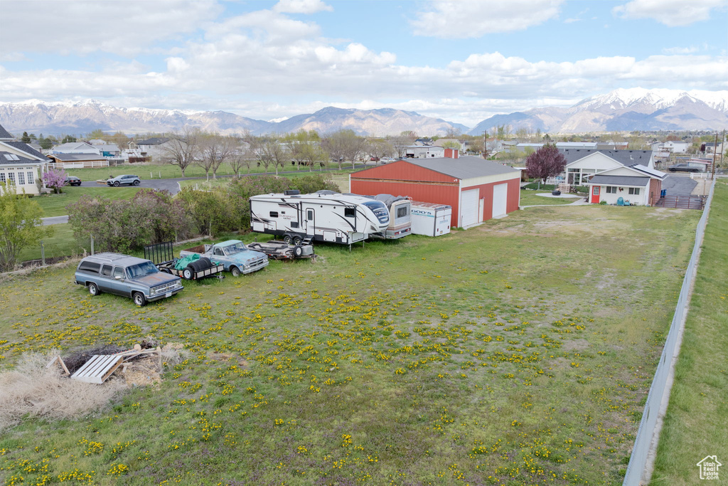 Birds eye view of property featuring a mountain view and a residential view