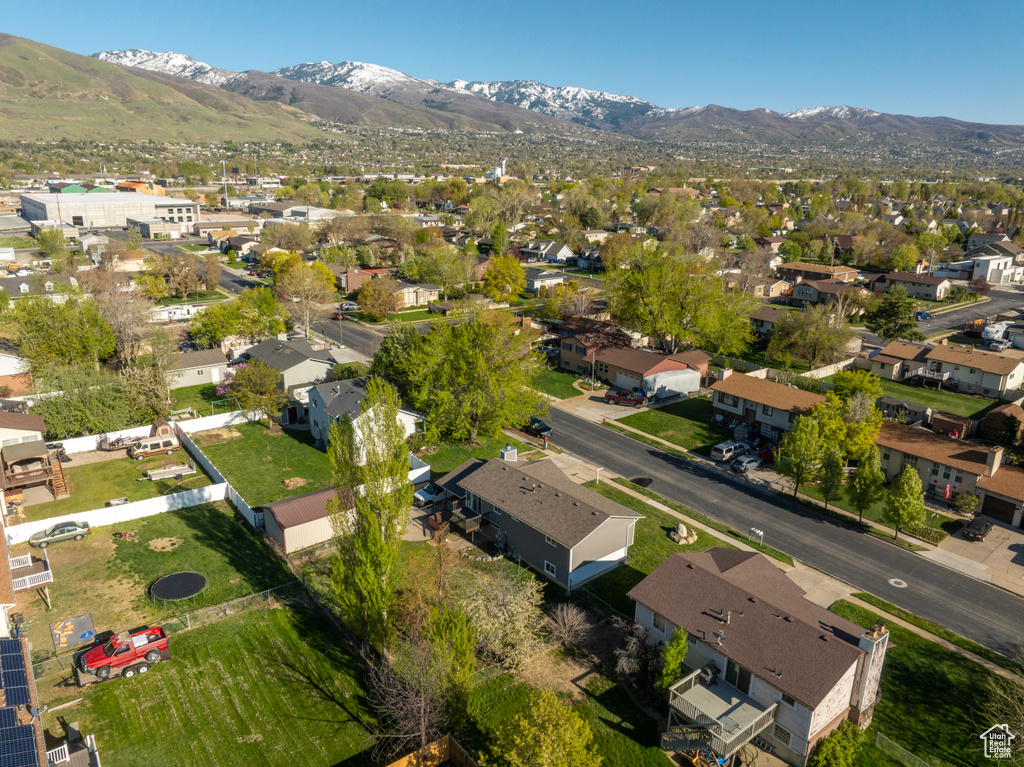 Drone / aerial view featuring a mountain view and a residential view