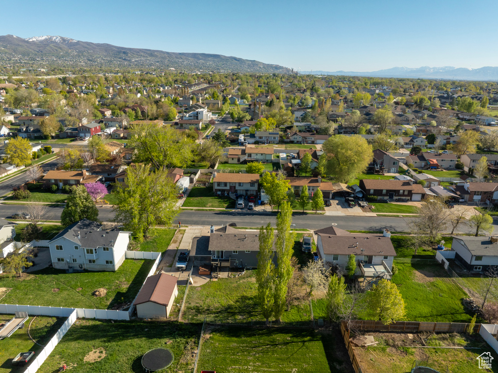 Aerial view featuring a mountain view and a residential view
