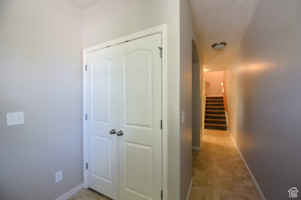 Hall with stairway and arched walkways