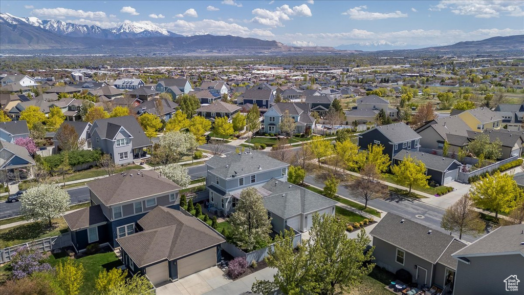 Drone / aerial view with a residential view and a mountain view