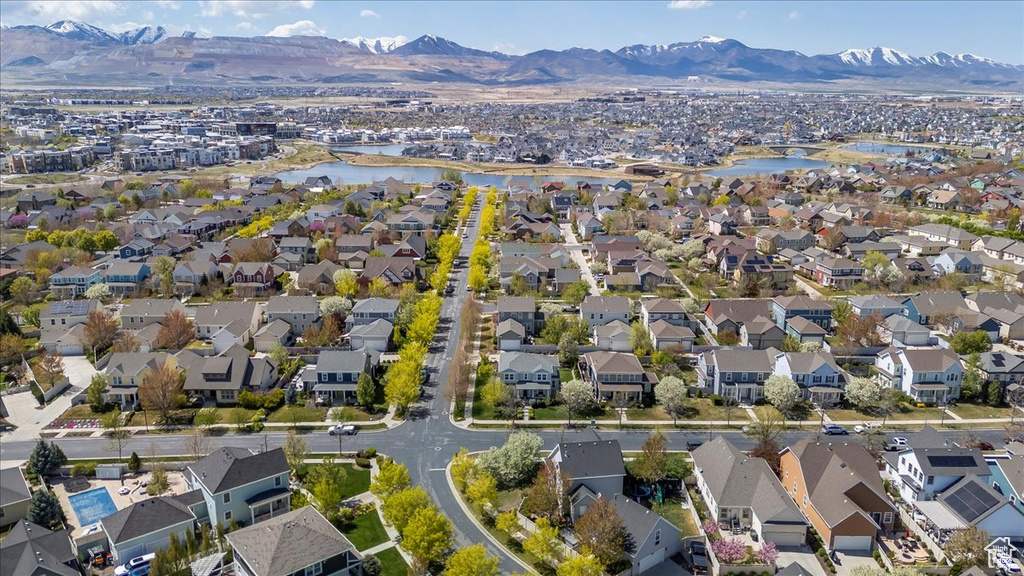 Bird's eye view with a water and mountain view and a residential view