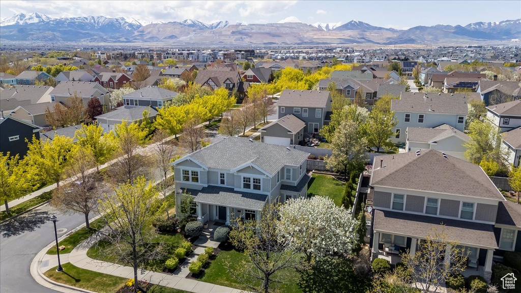 Drone / aerial view featuring a mountain view and a residential view