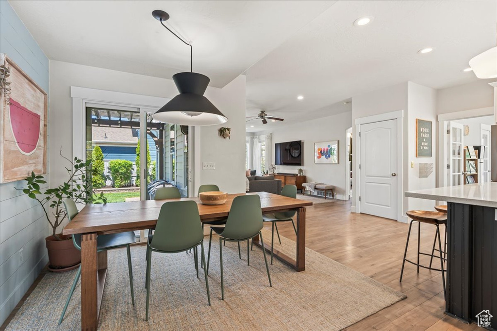 Dining area with recessed lighting, light wood-style floors, plenty of natural light, and ceiling fan