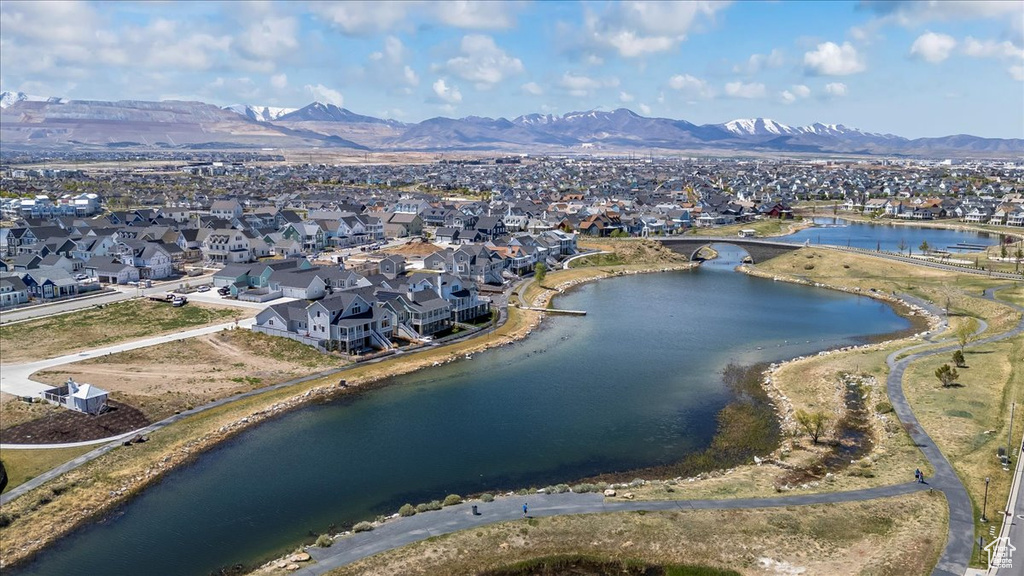 Bird's eye view with a residential view and a water and mountain view