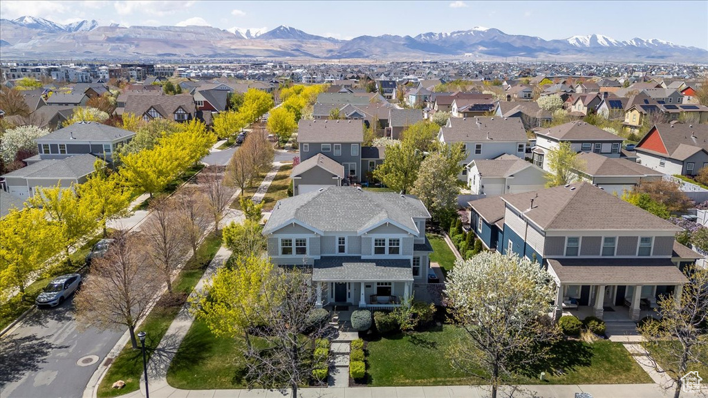 Birds eye view of property featuring a mountain view and a residential view