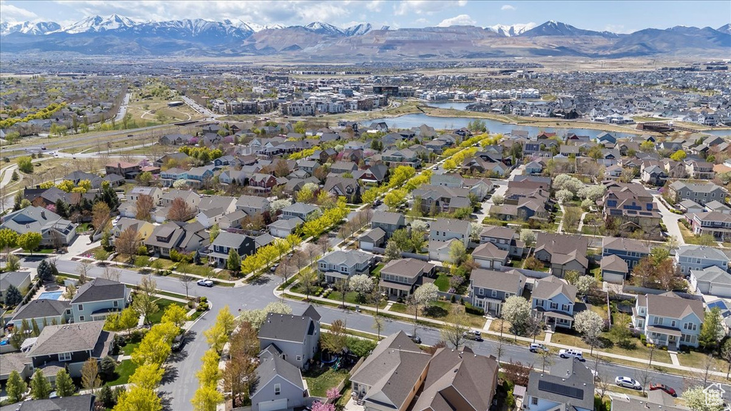 Aerial view featuring a water and mountain view and a residential view