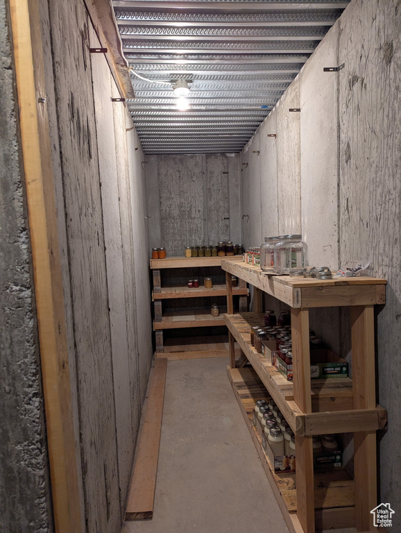 Unfinished below grade area with a workshop area