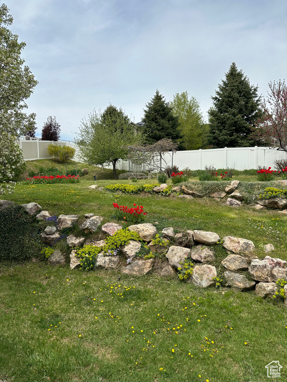 View of yard with fence