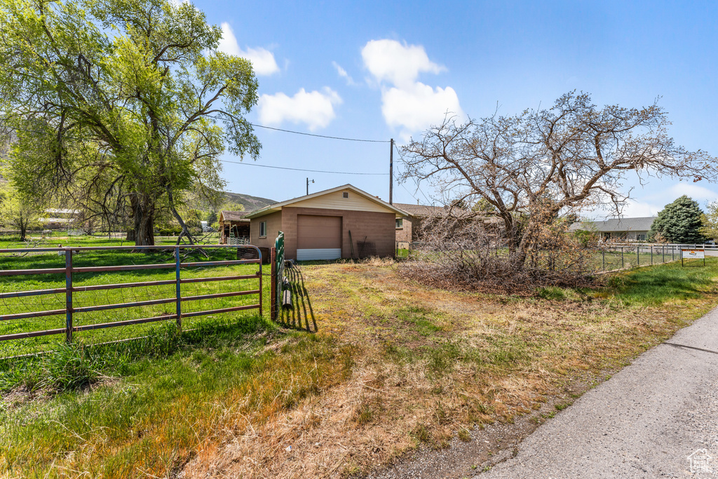View of front of house with fence