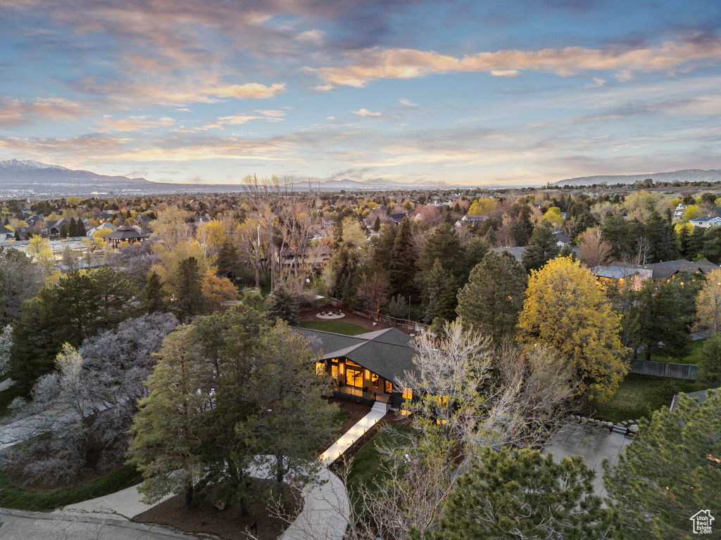 Birds eye view of property with a mountain view