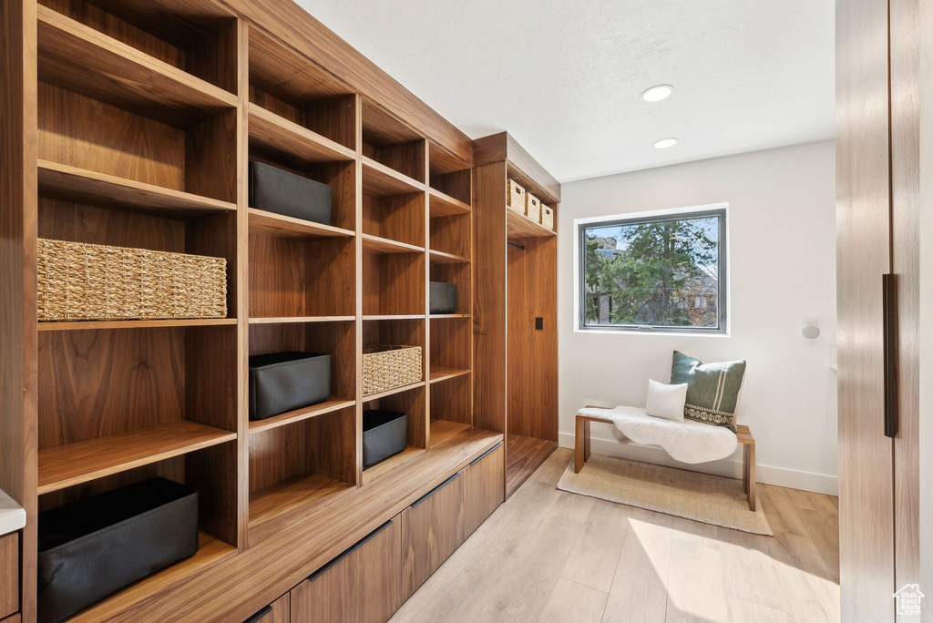 Mudroom with light wood-type flooring, baseboards, and recessed lighting