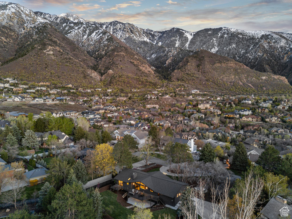 Property view of mountains with a residential view