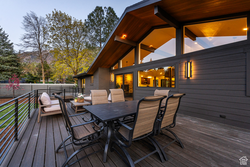 Wooden terrace with outdoor dining area