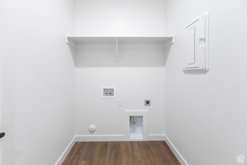 Laundry area featuring hookup for a washing machine, dark wood-style flooring, electric dryer hookup, and gas dryer hookup