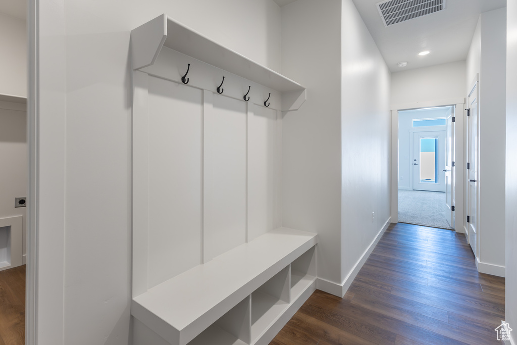 Mudroom with dark wood-style floors and recessed lighting