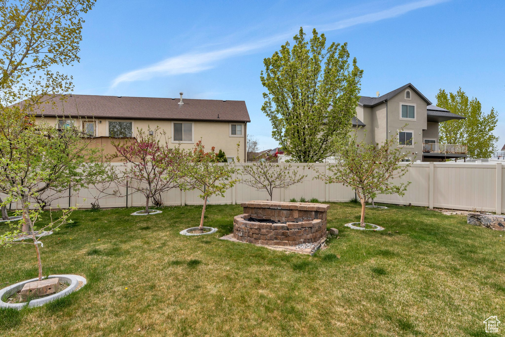 View of yard featuring fence