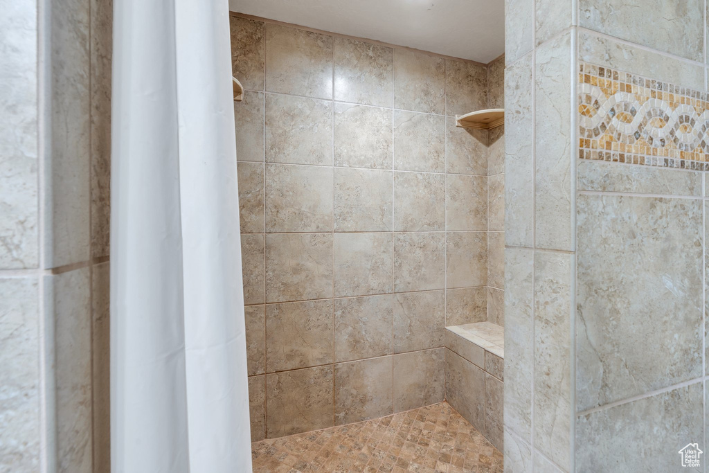 Bathroom with a tile shower