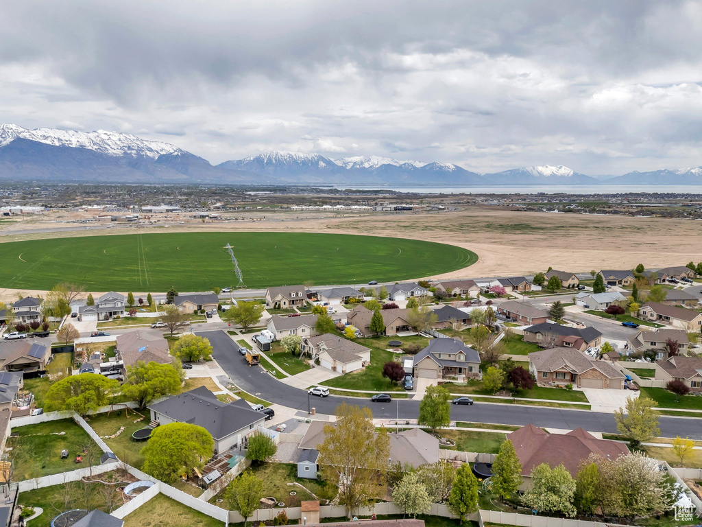 Birds eye view of property featuring a residential view and a mountain view