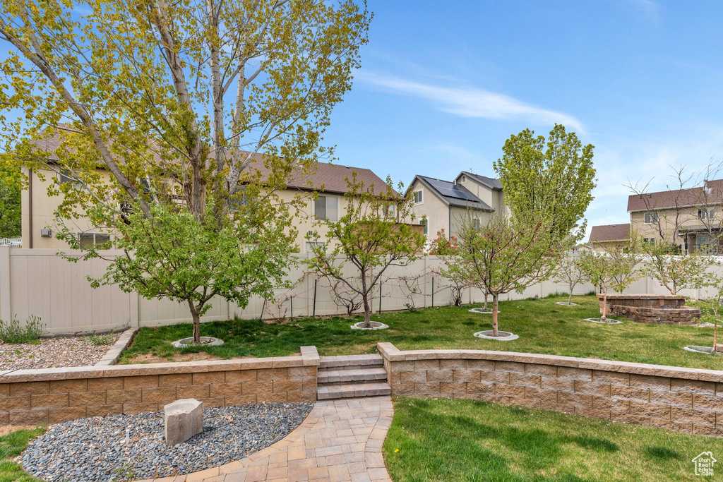 View of yard with a fenced backyard