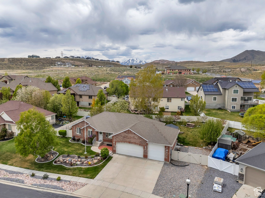 Drone / aerial view with a mountain view and a residential view