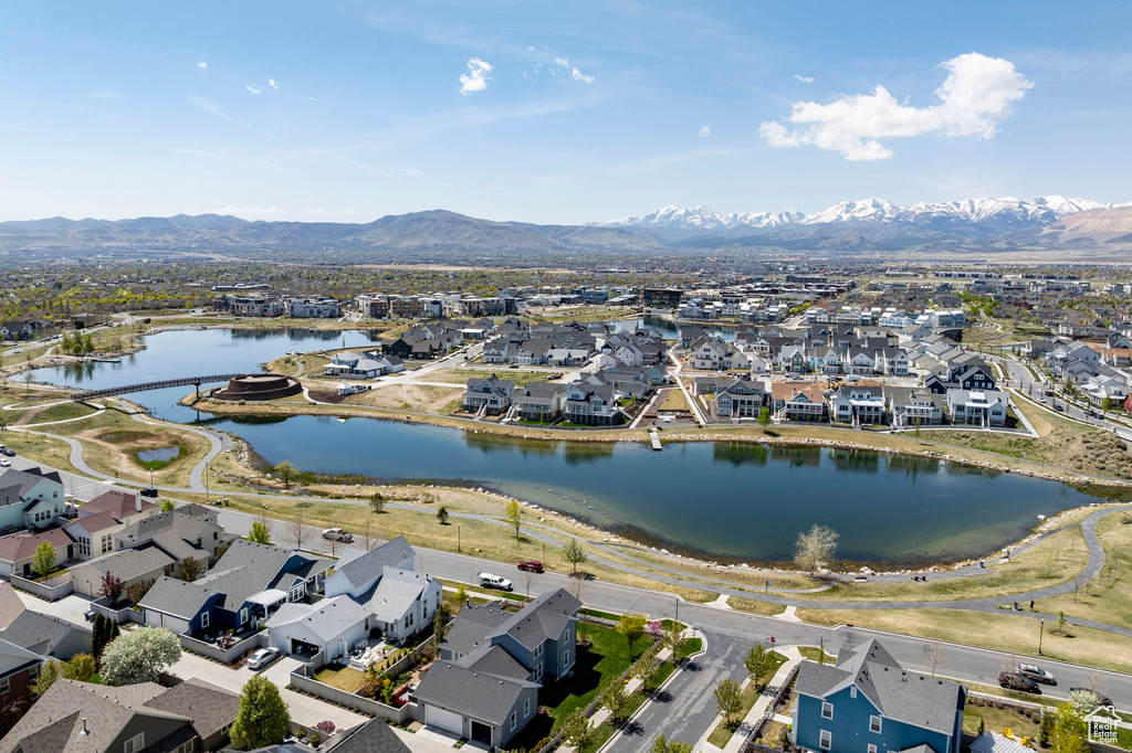 Aerial view featuring a water and mountain view and a residential view