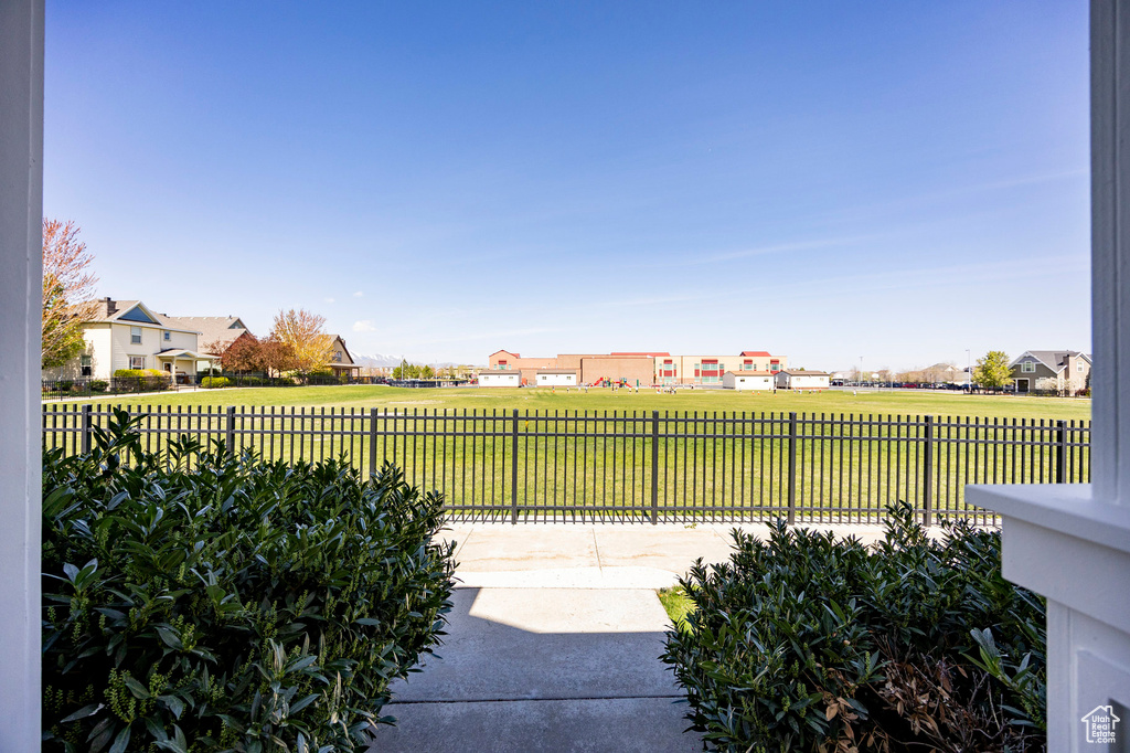 View of patio featuring a residential view and a fenced backyard