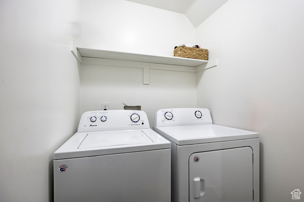 Laundry area with washer and clothes dryer and laundry area
