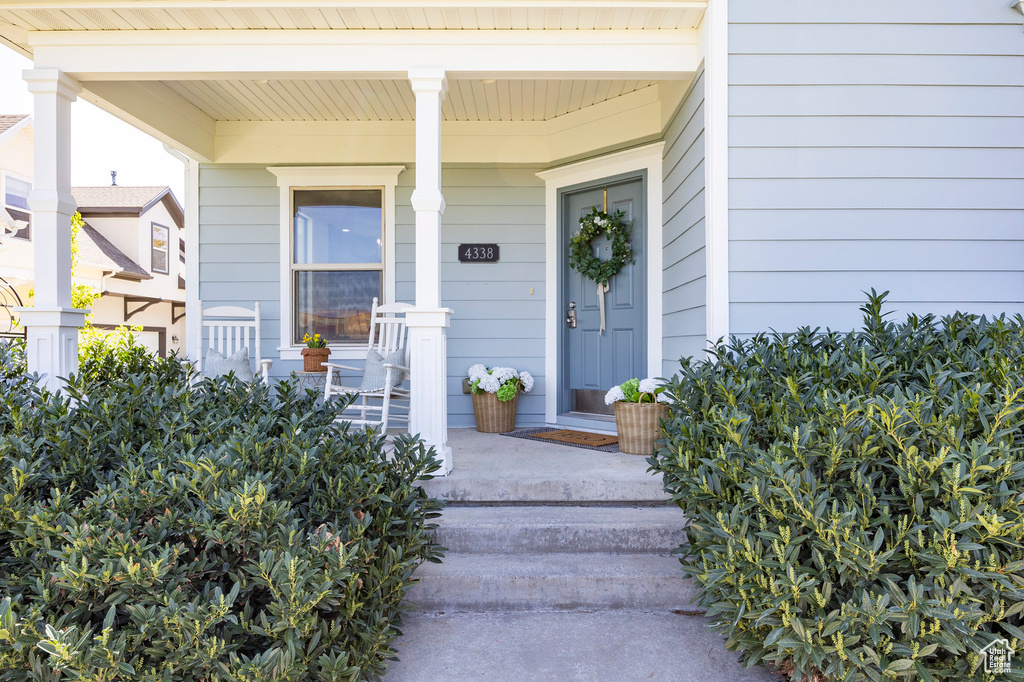 Entrance to property with a porch