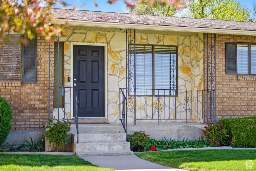 Property entrance with brick siding