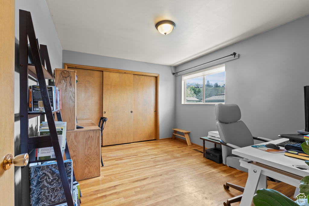 Office space featuring light wood-style flooring