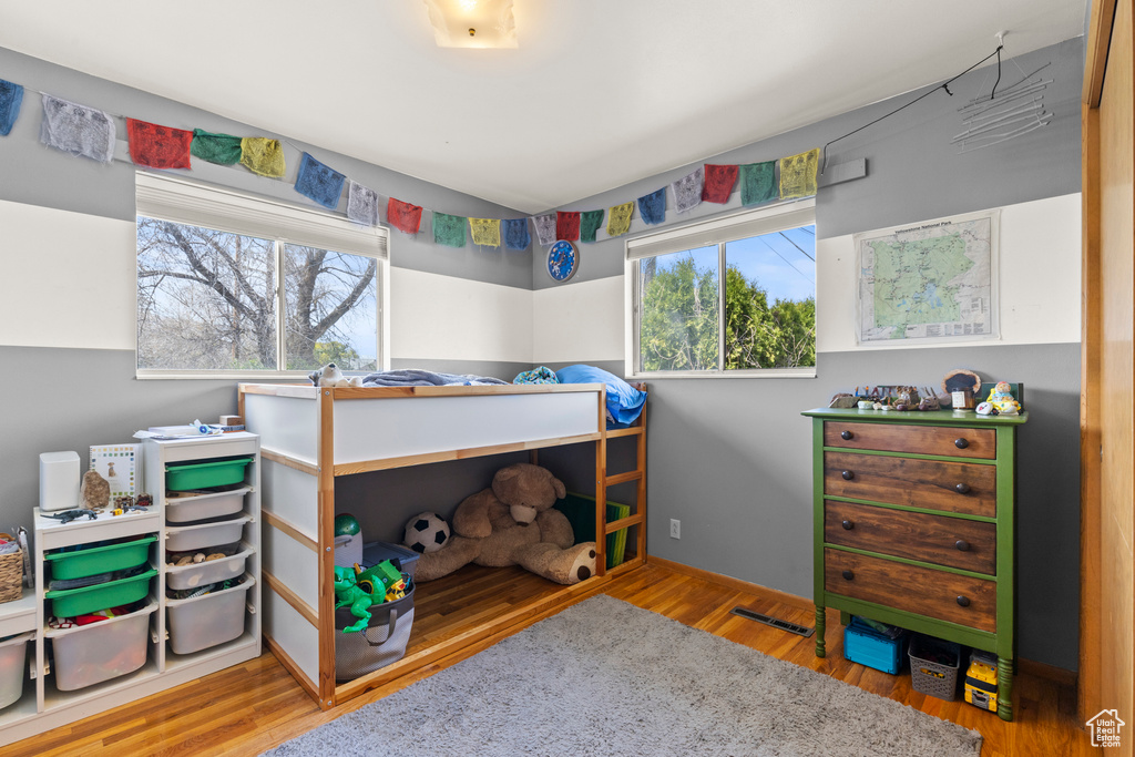 Bedroom with wood finished floors