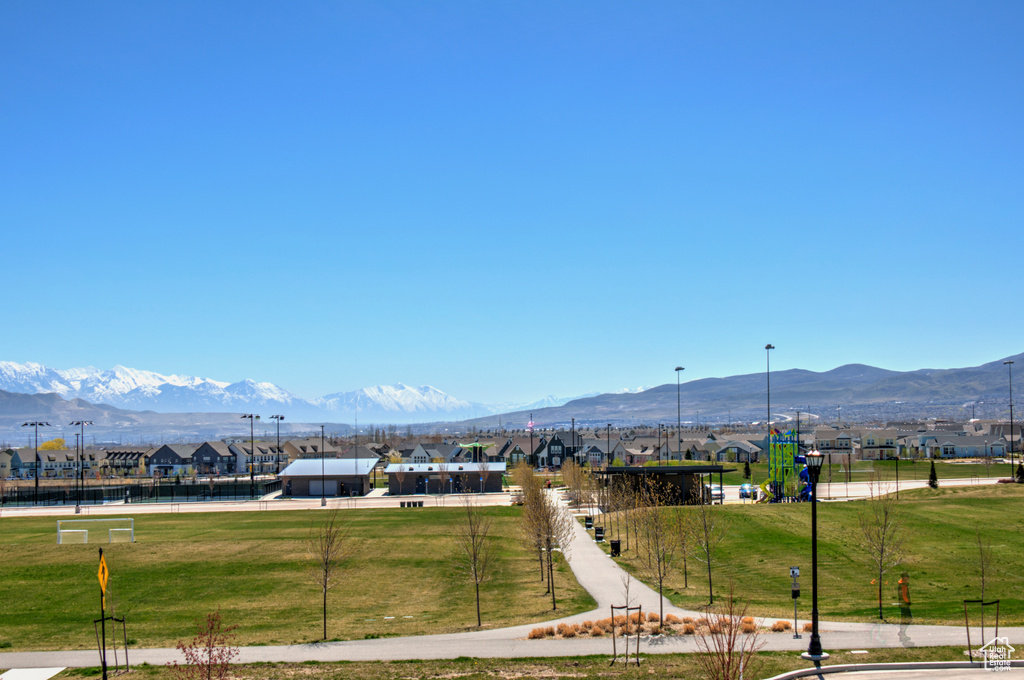 Property view of mountains featuring a residential view